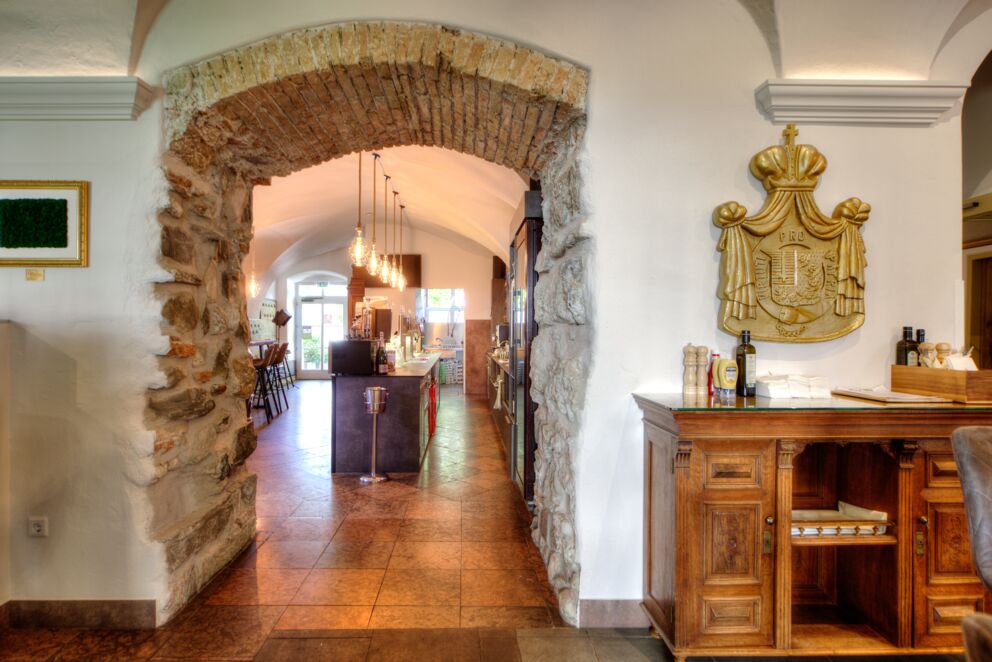 The entrance to the Benediktus Restaurant, Bar and Café at the Schlosshotel Mondsee in the Salzkammergut.