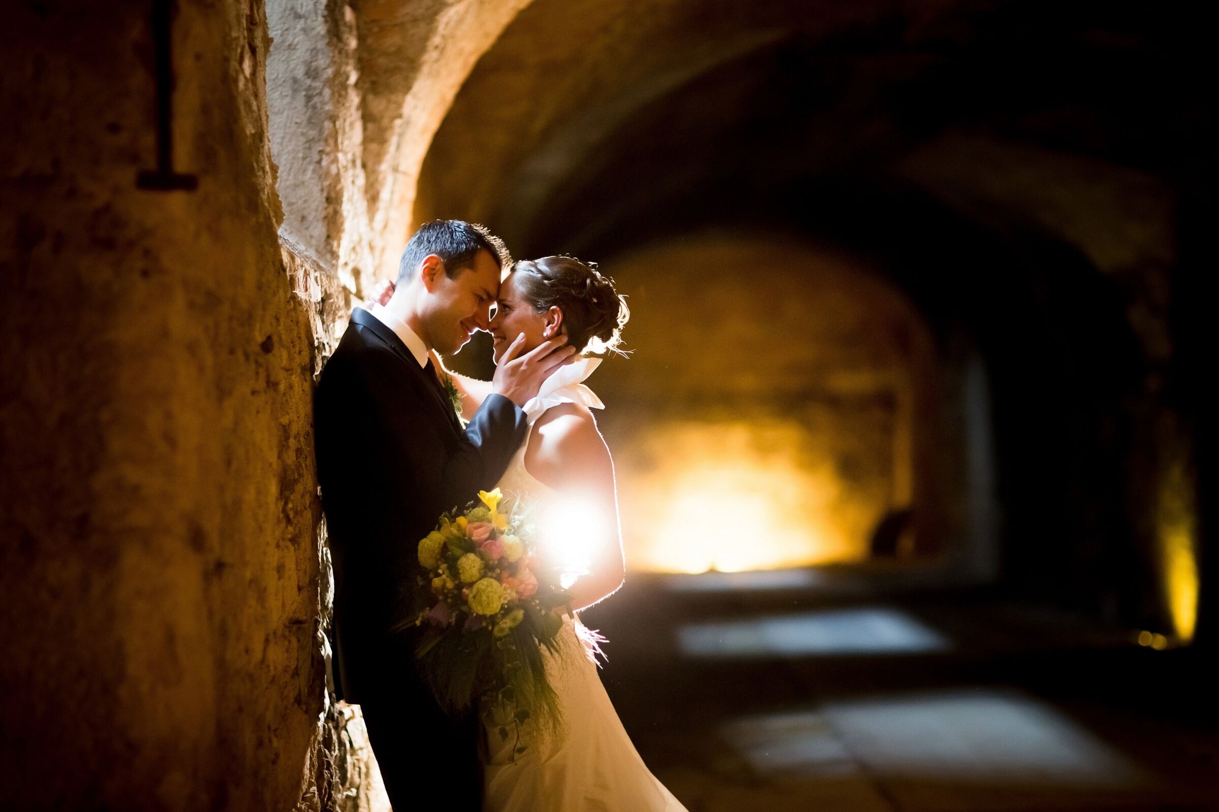 Bride and groom in love during their wedding at Mondsee Castle